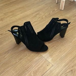 Madden black booties with cut out details. Size 8.5